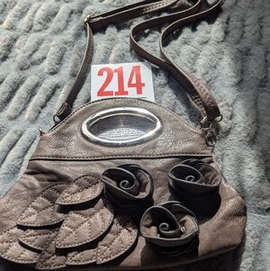 Lot 214 Taupe-colored crossbody handbag featuring deco With Floral Design